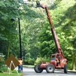 Photo of LED streetlight being installed.