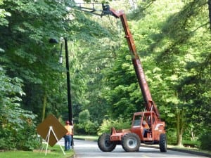 Photo of LED streetlight being installed.