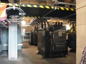 Photo of transformers in an underground vault.