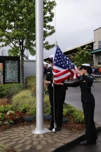 Photo of Liberty High School NJROTC color guard raising flag.