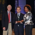 Photo of General Manager and CEO Jorge Carrasco receiving award.
