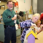 Photo of City Light employee and granddaughter.