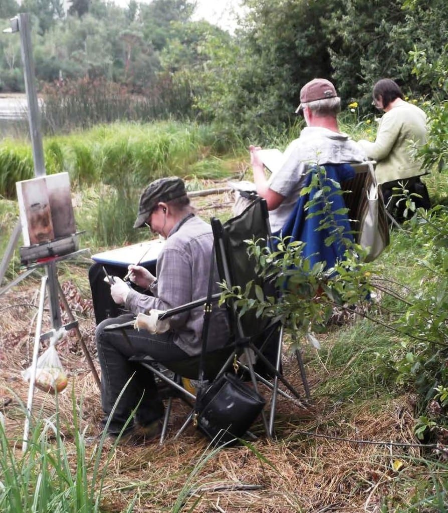 Photo of artists along the Duwamish River.