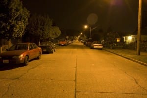 Photo of a street lit by high-pressure sodium streetlights.