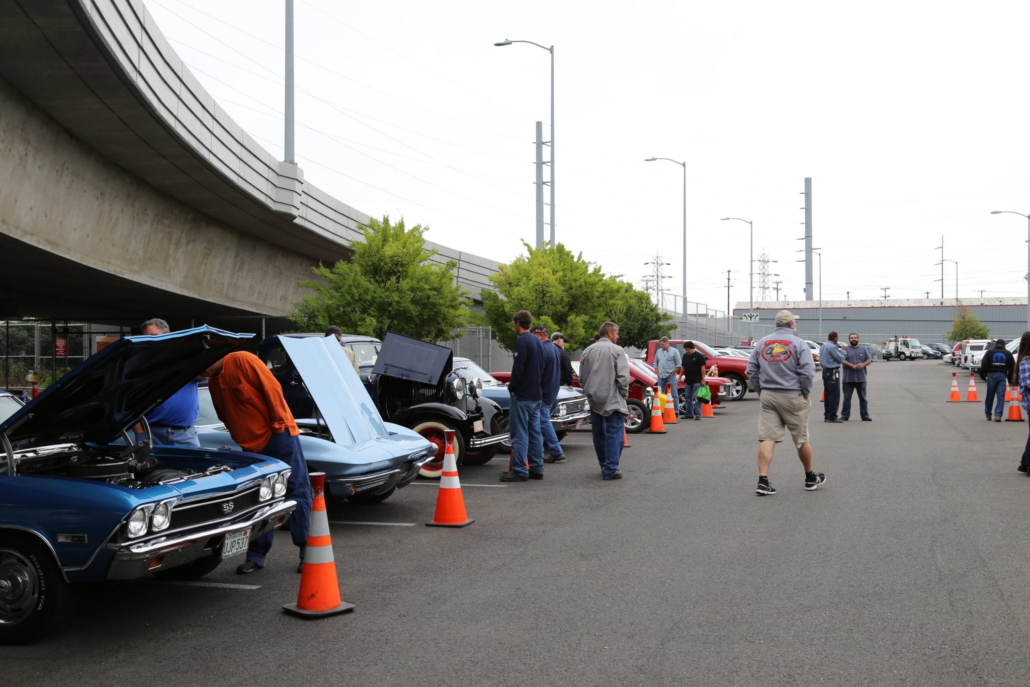 Employees enjoyed the diverse cars that were on display at the car show.