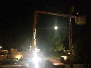 Photo of a crew working at night