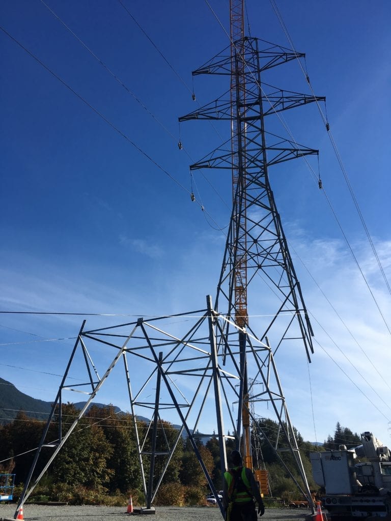 Crews relocating one of the two transmission towers