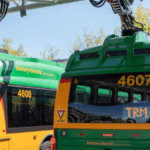 Green and yellow King County Metro electric buses