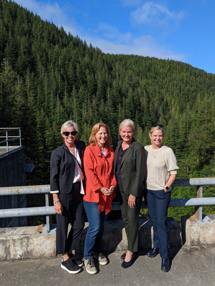 From left: General Manager and CEO Debra Smith joins U.S. Rep Kim Schrier (D-Wash.), U.S. Secretary of Energy Jennifer M. Granholm, and Puget Sound Energy CEO Mary Kipp at Cedar Falls earlier this month.