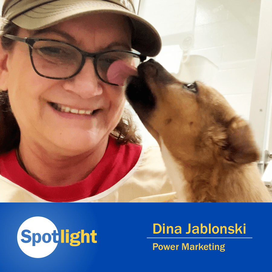 Picture of Dina Jablongski with pet dog