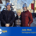 Spotlight photo of Jade Mott standing with two other people in winter clothes
