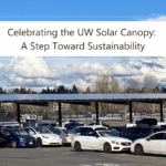 Featured image showing solar canopy in parking lot surrounded by cars